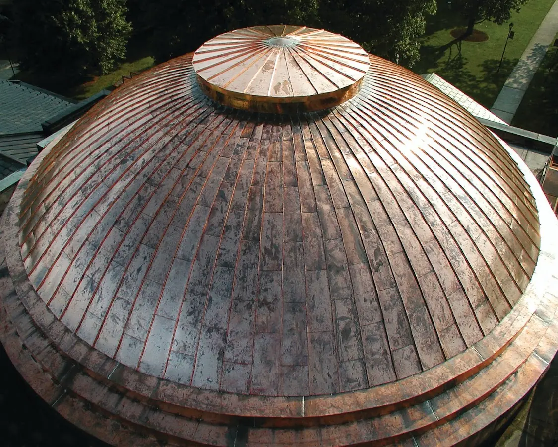 Craftsman Roofing crew installing a new roof in Belmont Park